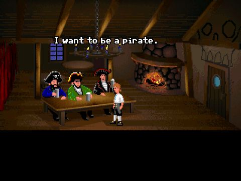 Guybrush Threepwood sawing the well-known sentence "I want to be a pirate" in front of three pirates.
