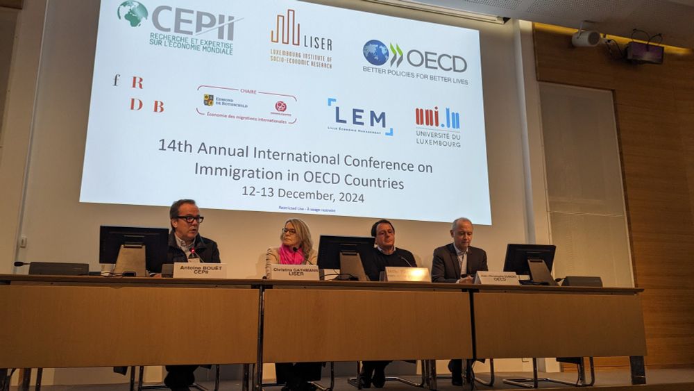 Photo of opening panel (Antoine Bouët, Jean-Christophe Dumont, Christina Gathmann and Hillel Rapoport) 