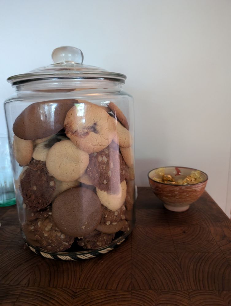 A 6 litre jar of assorted biscuits 