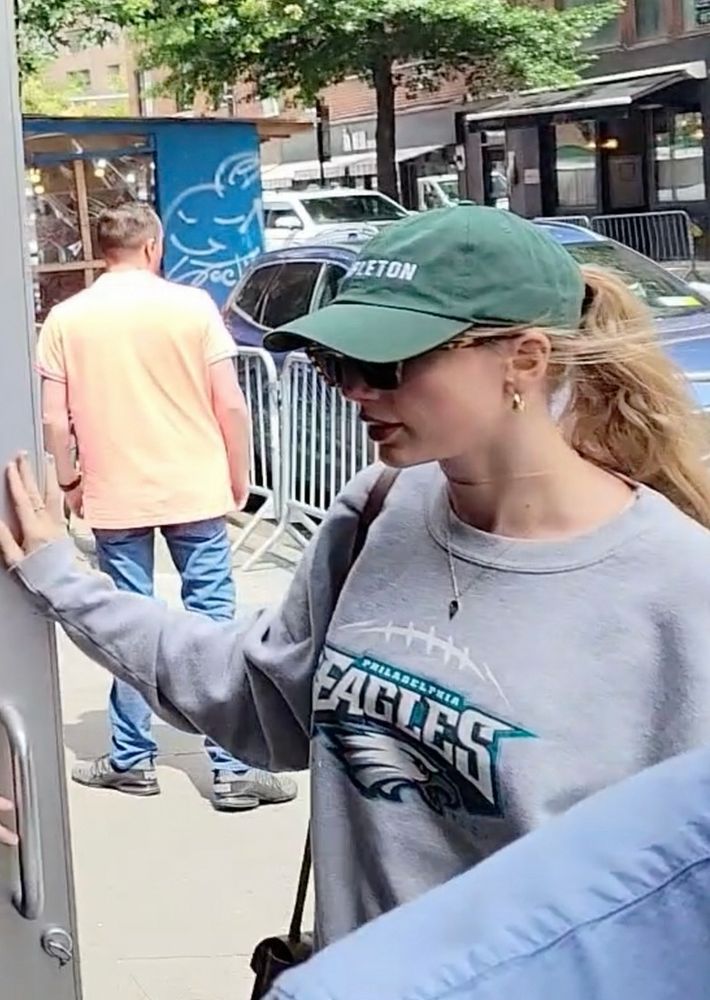 taylor in an eagles sweatshirt 
