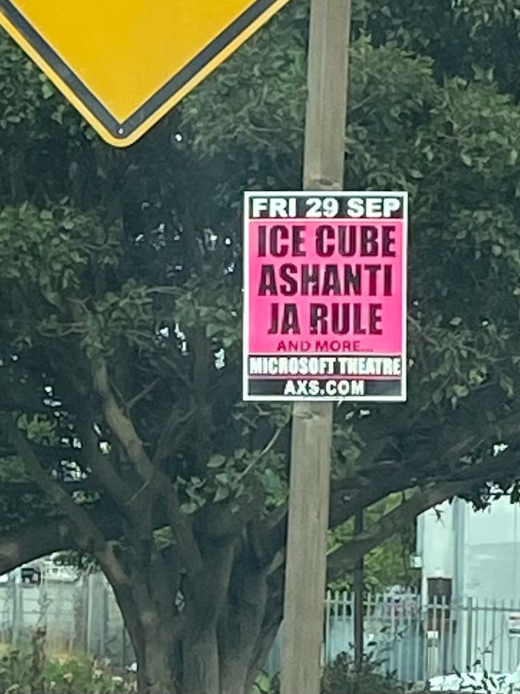 poster sign advertising concert by Ice Cube, Ashanti and Ja Rule