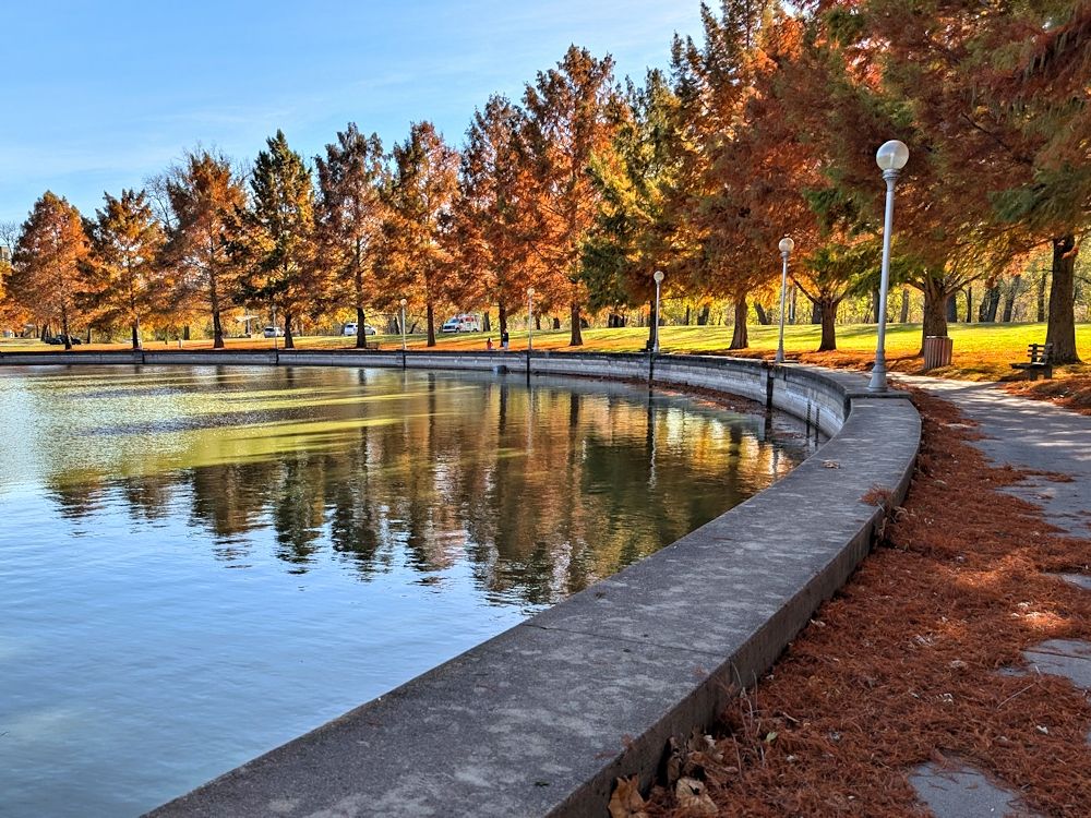 Mill Race Park was once an impoverished area of Columbus at the confluence of the  Flat Rock and the Driftwood rivers which often flooded and was so prone to disease that it was called Death Valley. In 1963, the city purchased 83 acres and turned it into a park. In the 1980s, it was totally redesigned and renovated into the current park with the operator work being done by students from Atterbury Job Corps. The park includes the pond, a viewing area of the confluence, an amphitheater, walking trails along the rivers, fountains, boat docks, fishing areas, large open areas, and many picnic areas.