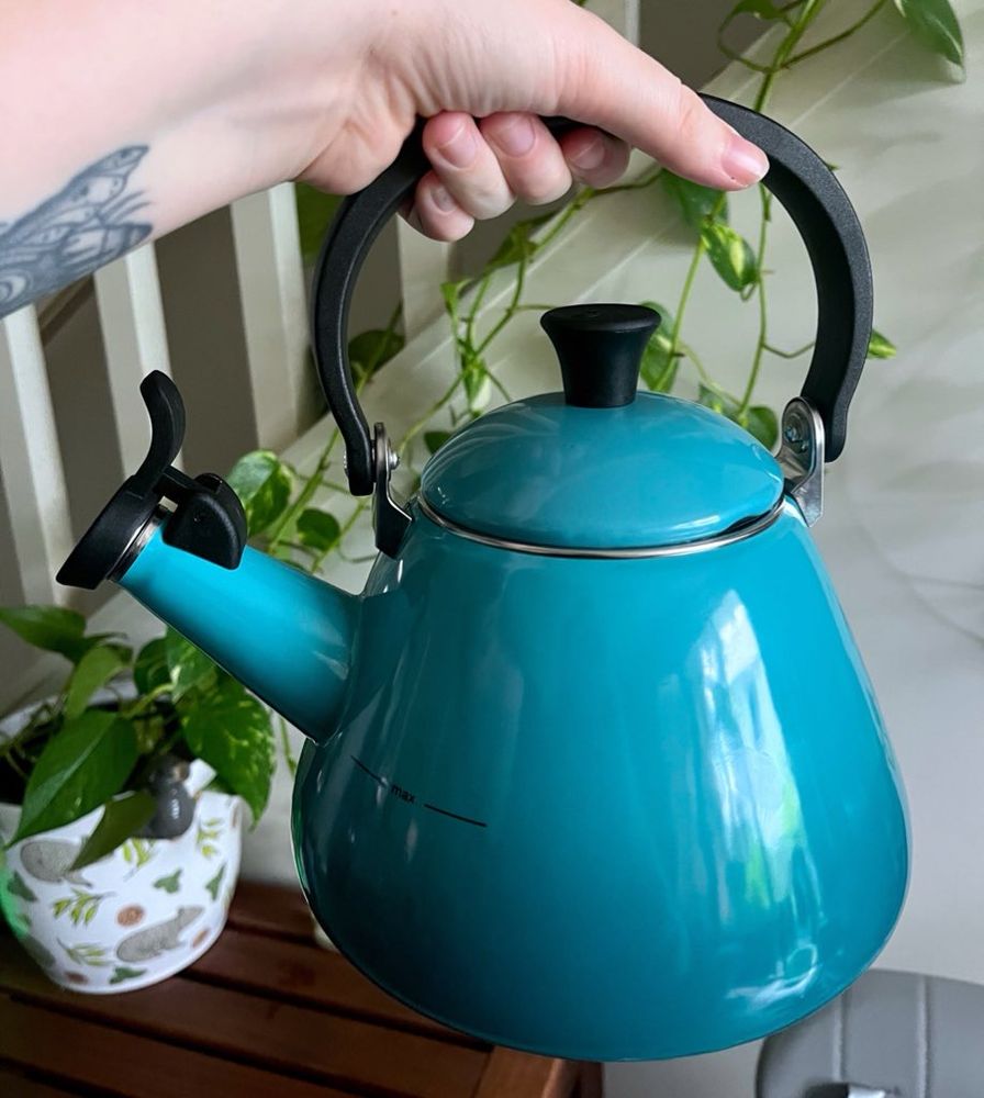 a blue le creuset kettle