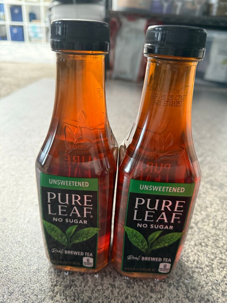 Two bottles of unsweetened tea.