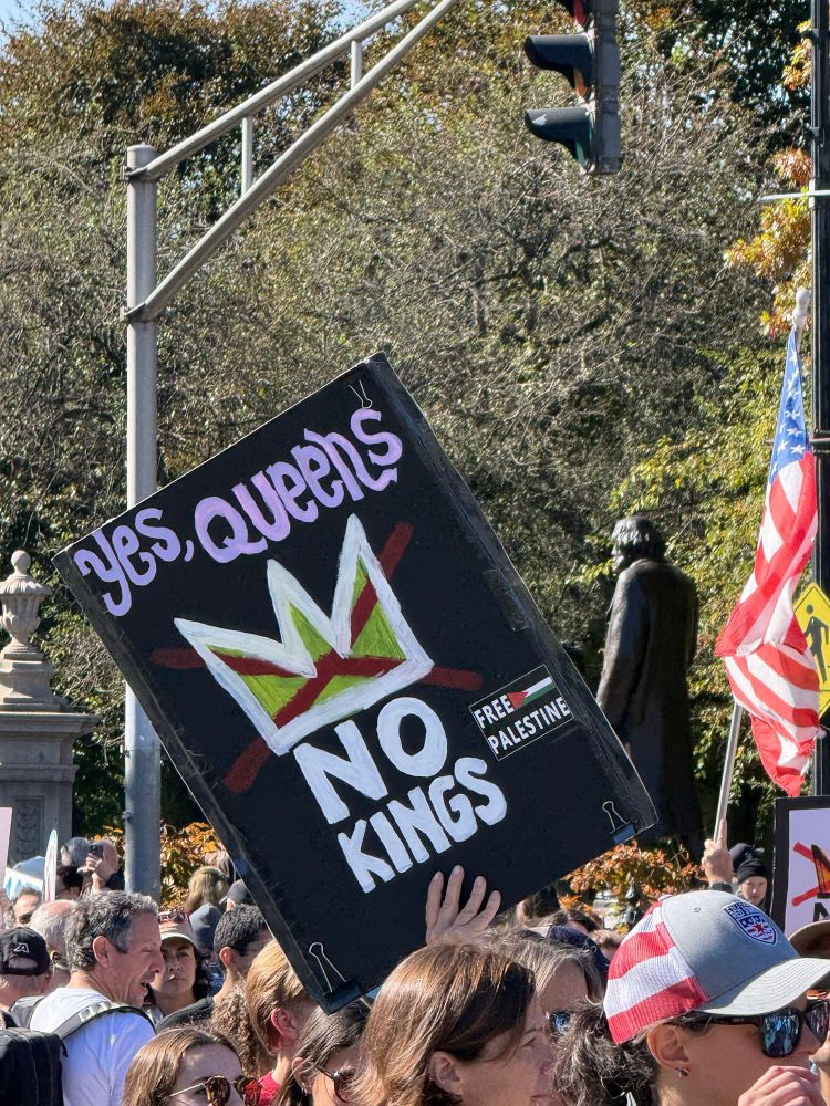 A photo from the No Kings protest in Boston common. A sign reads ‘yes queens, no kings’