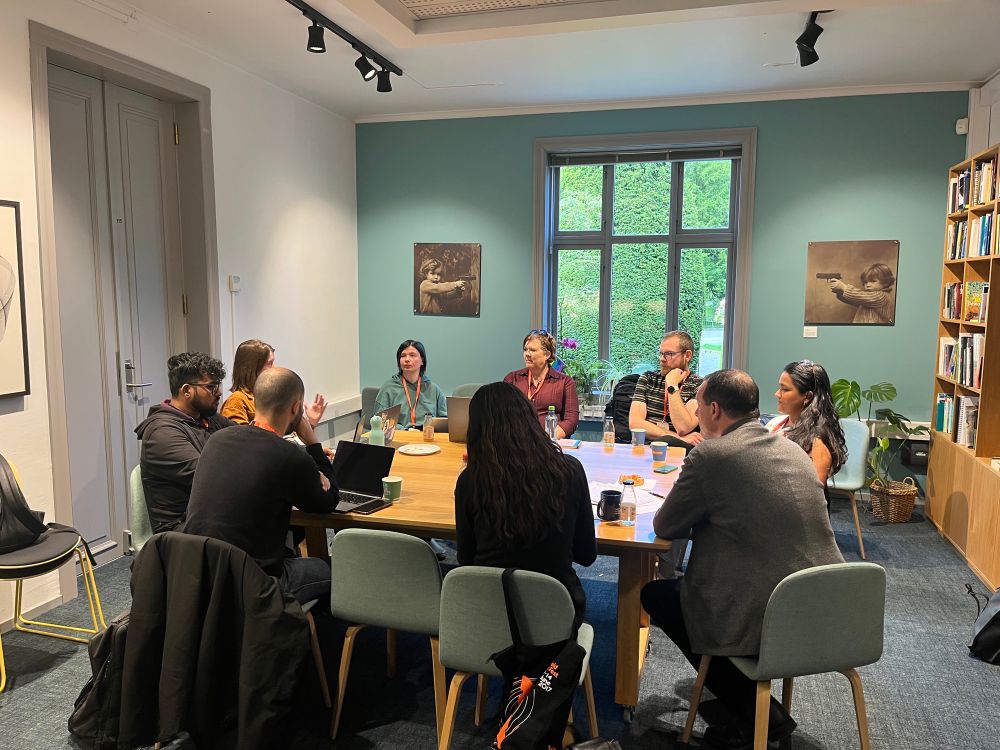 People discussing in the CDN lounge. 