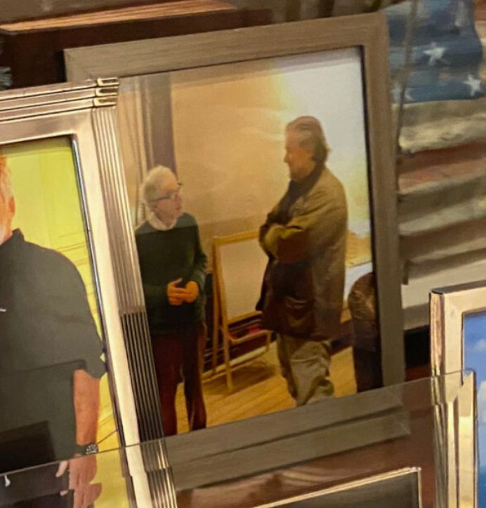 What I believe is a framed photo of Woody Allen and Steve Bannon at Epstein's house