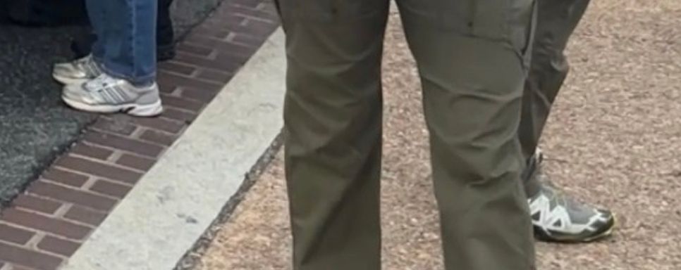 screen shot of an image showing federal fascists wearing white sneakers. 
