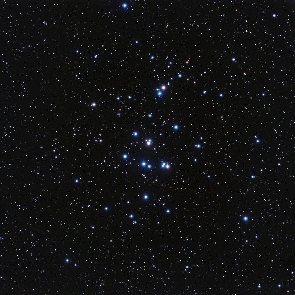 Image depicts the Beehive Star Cluster, also known as M44 or Praesepe, and amongst a backdrop of many stars, depicts 30 - 50 particularly brighter ones clustered closely together on the image.

Image credit - NASA JPL and Stuart Heggie