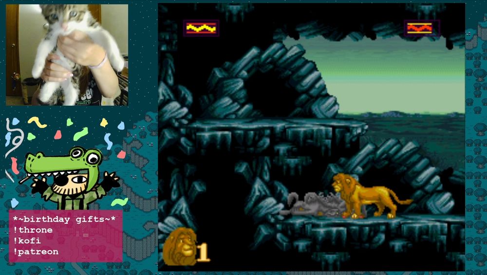 holding up a kitten like simba in the lion king
while playing Lion King on snes
