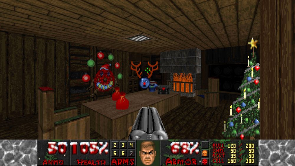 A small cozy room with a blue megasphere with reindeer antlers and a red nose on a wooden table. To the right is a Christmas tree, and in the background is a fireplace. To the left of the fireplace is the picture of the back of a cacodemon with a smiley face painted on it with red and green balls hanging above it.