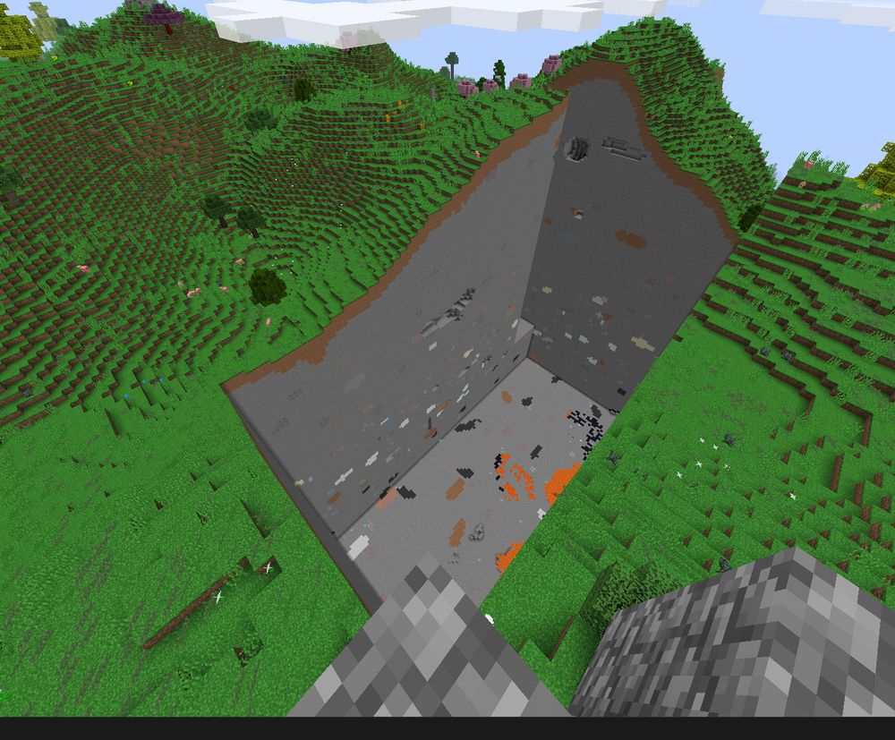 A big hole, which is the start of the new base meant to house the rest of the playthrough's machines and structures