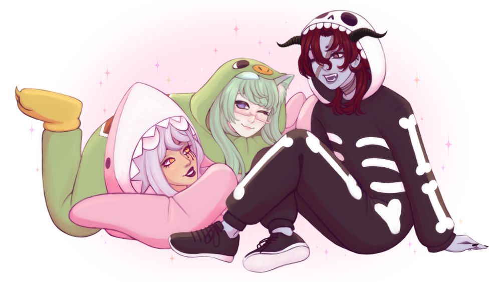 Wisty is wearing a pink shark kigurumi and lying on the ground. Salty is wearing a green turtle kigurumi and is lying on top of Wisty. Delun is wearing a skeleton kigurumi and sitting beside them. All three are smiling at each other. 