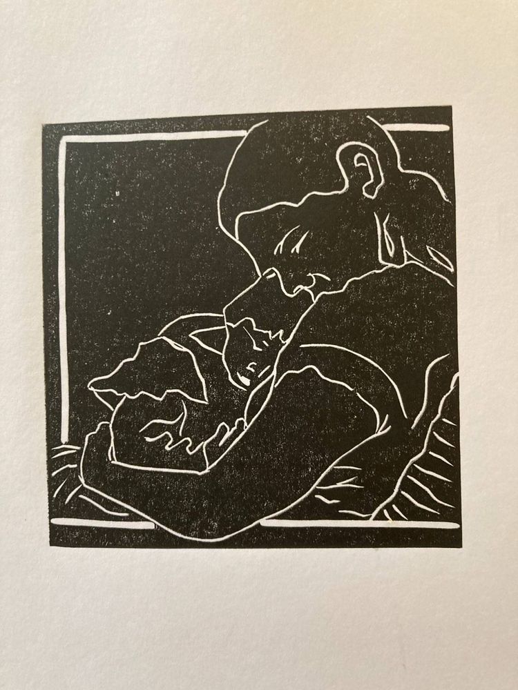 Lino print image in black and white depicting a mother holding a child.