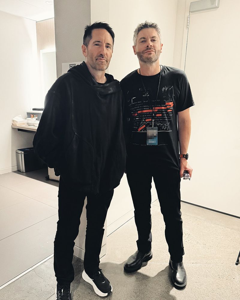 It is Trent Reznor and me standing in TR's dressing room at the Nine Inch Nails show in Seattle, WA 25.08.12. We are wearing black.