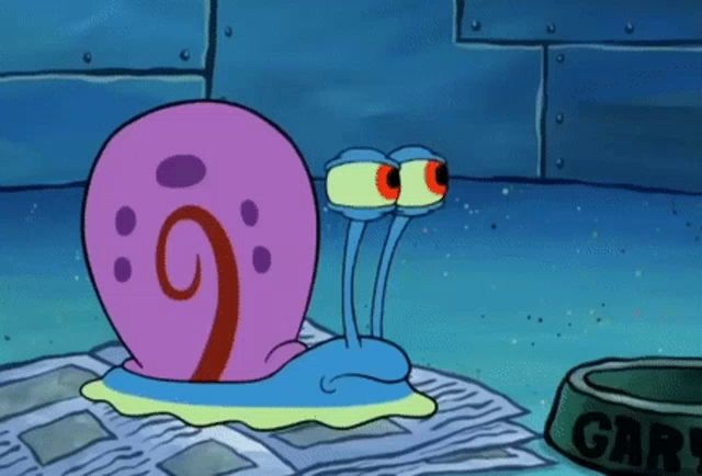 gary the snail from spongebob squarepants is laying on a newspaper next to a dog bowl