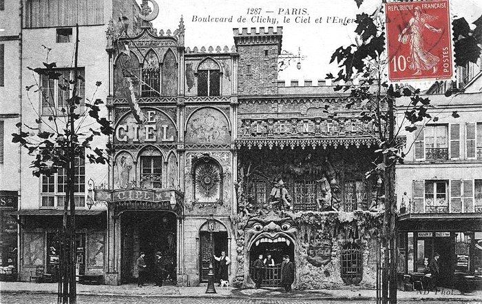 A black-and-white postcard of a streetscape in Paris, showing two cabaret, Le Ciel, which looks vaguely like a gothic cathedral, and L'Enfer, with a hell mouth for the doorway. Caption reads  1287 - PARIS. Boulevard de Clichy, le Ciel et l'Enfer