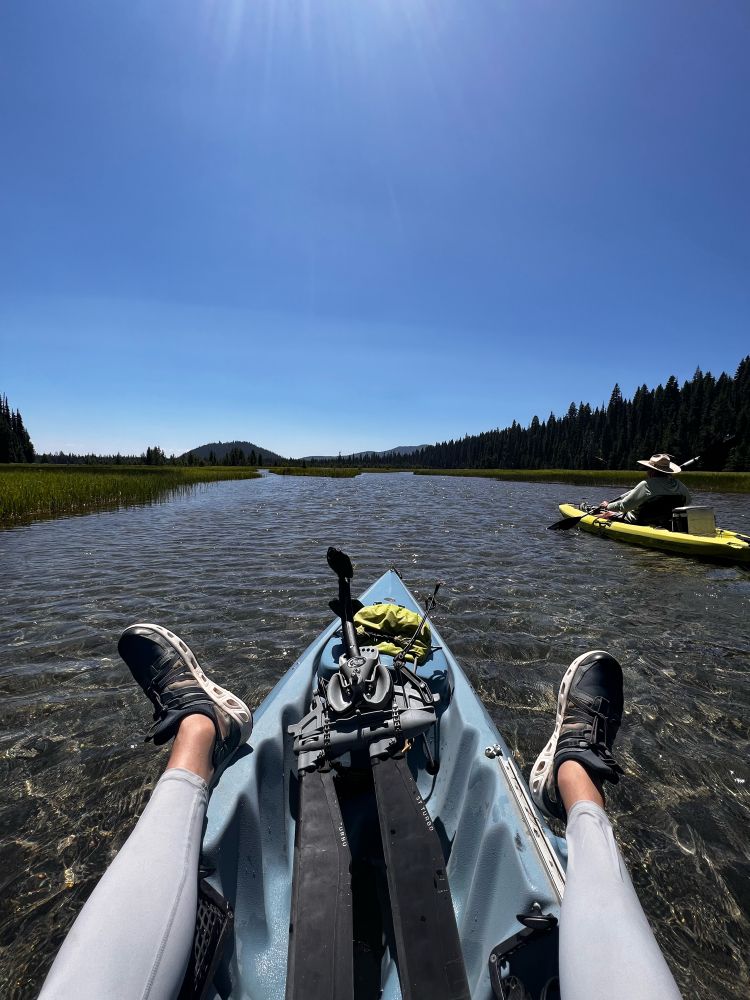 Floating on a kayak on a small stream 