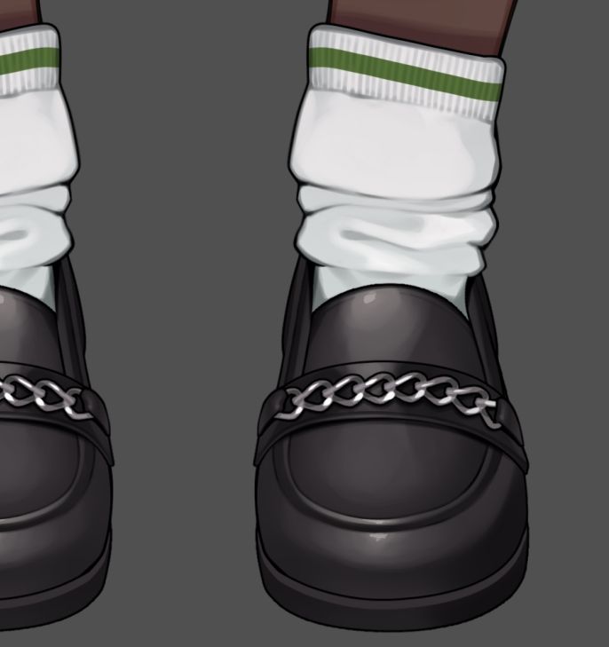 closeup of loafer shoes with chains 
