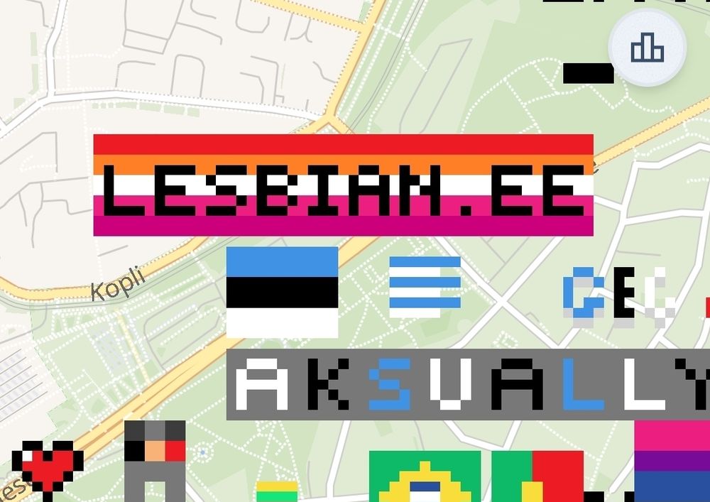 "lesbian.ee" text with lesbian flag background on wplace.live