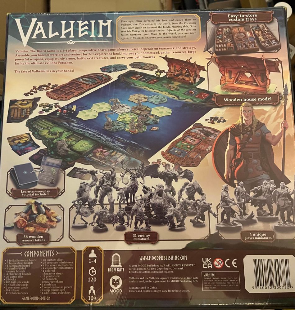 The back of the box for the Valheim board game. It has images of the box content and an explanation of the setting. 