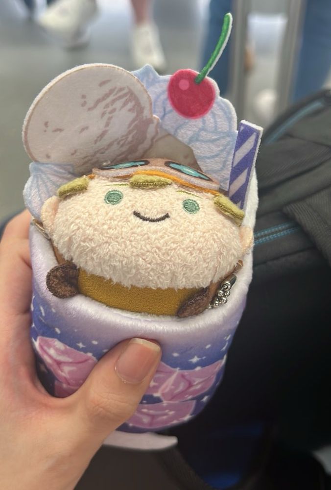 Bean plushie of Herlock Sholmes. He is inside a sundae plushie holder