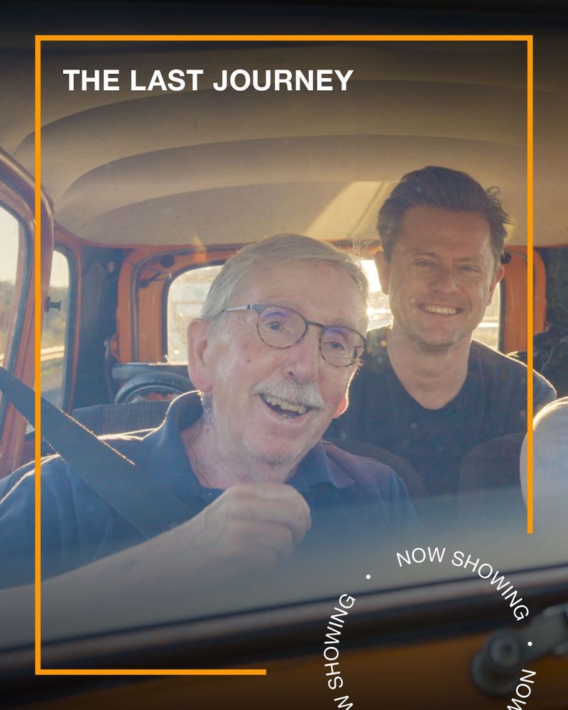 Two men and an elderly man drive an orange car together, laughing. Text - The last journey, now showing.