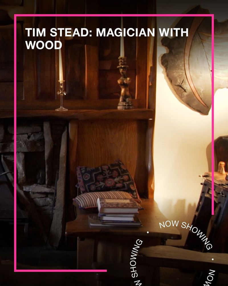 A beautiful handcarved wooden fireplace Text - Tim Stead: Magician with Wood, Now Showing.
