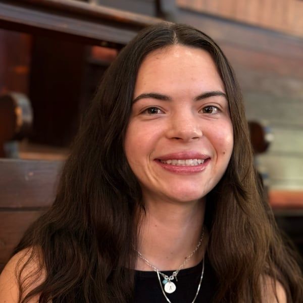 Addi Schwieterman, a young woman with long dark hair.