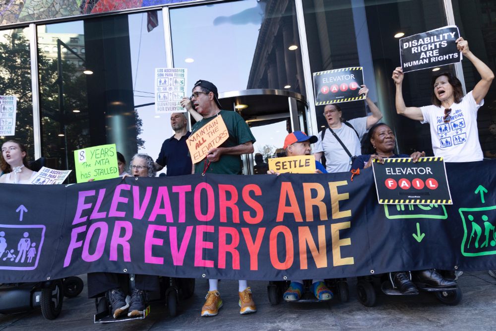 Photo of a banner that reads Elevators are for Everyone 