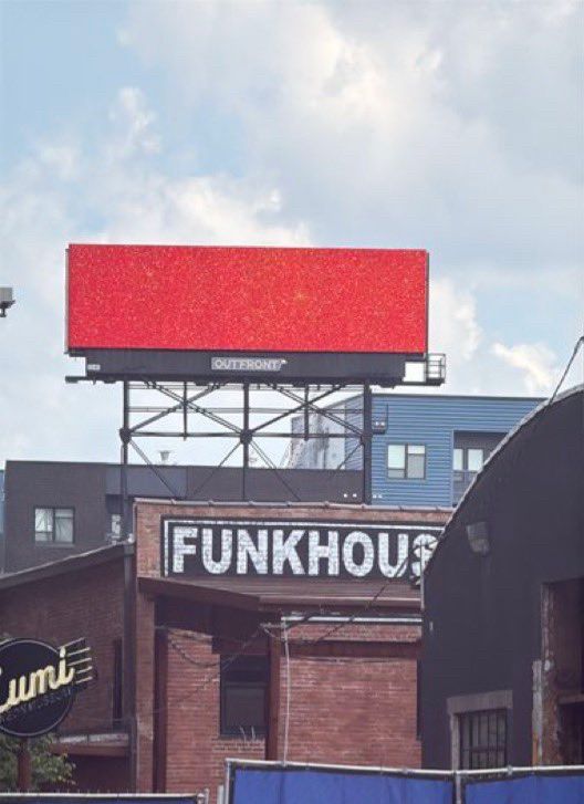 Billboard in Kansas City glittery orange