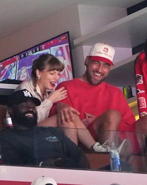 Taylor Swift and Travis kelce laughing at the Stanley cup Final 