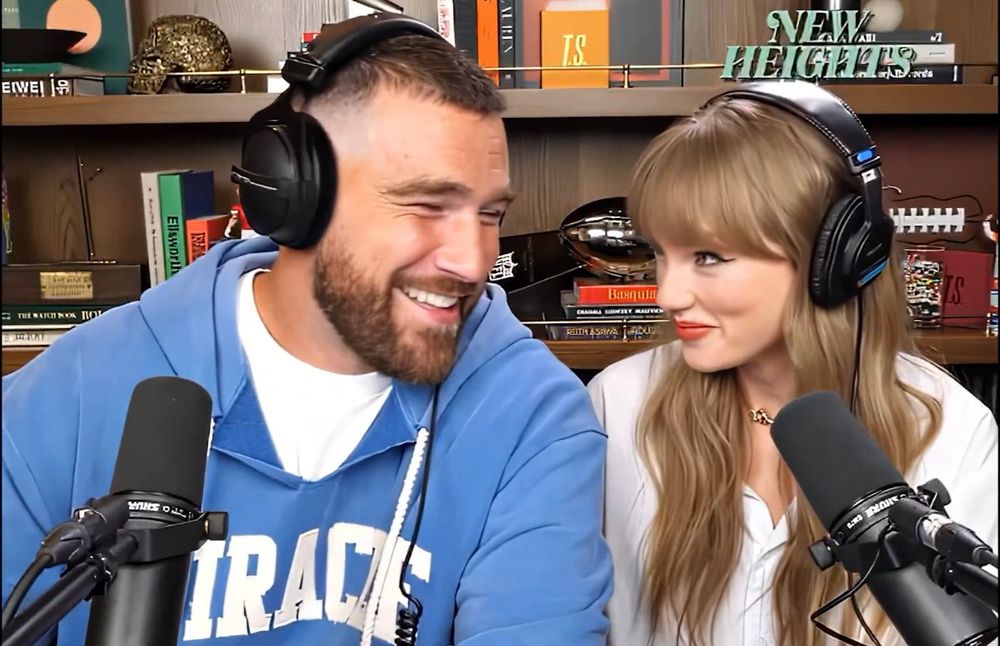 Taylor Swift and Travis Kelce looking at each other during the new heights episode 
