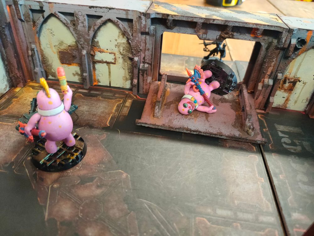 Two 32mm mister bobby miniatures wresting in the underhive 