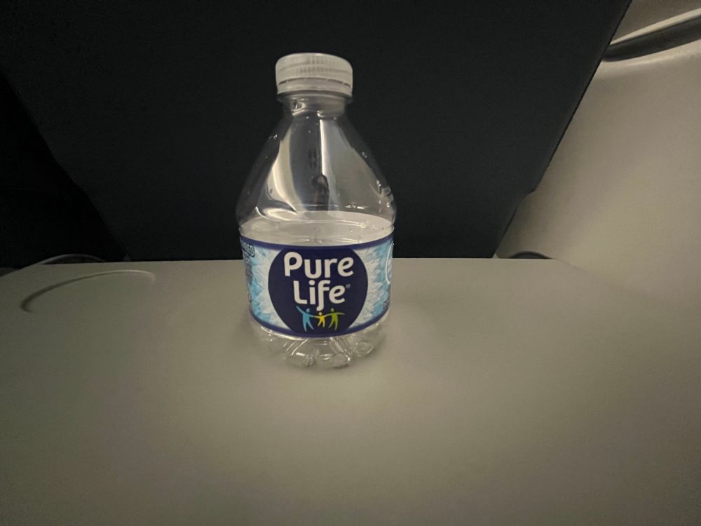 A single-use disposable plastic water bottle.  