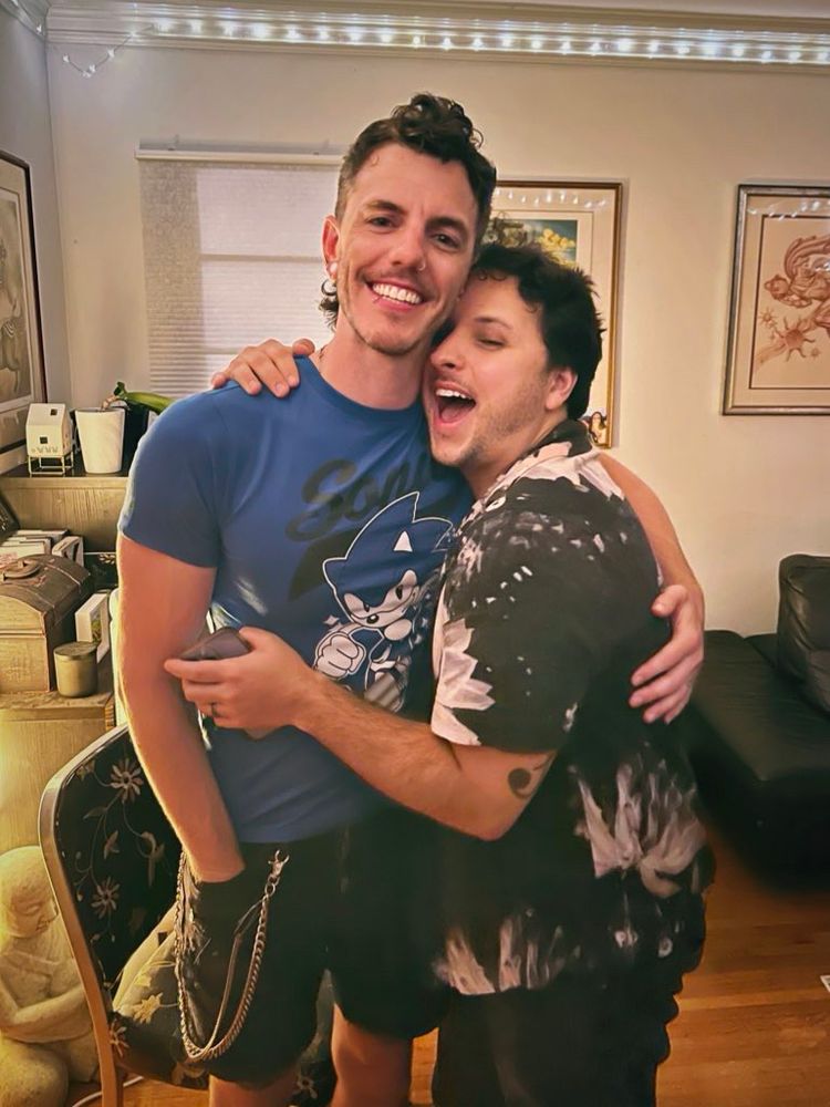 Kasey + James smile while sharing an embrace the night before their birthday :)