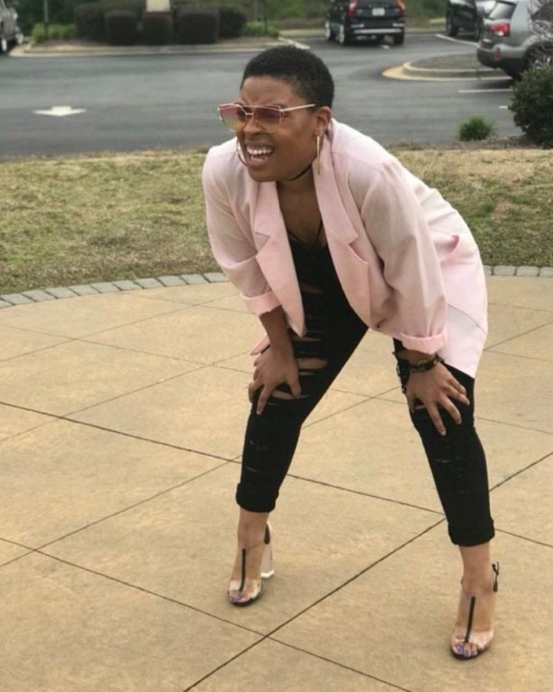 Beautiful woman exhausted hands on knees wearing sunglasses meme