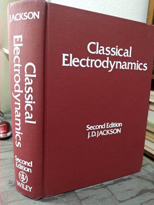 Classical Electrodynamics by JD Jackson, white print on red cover