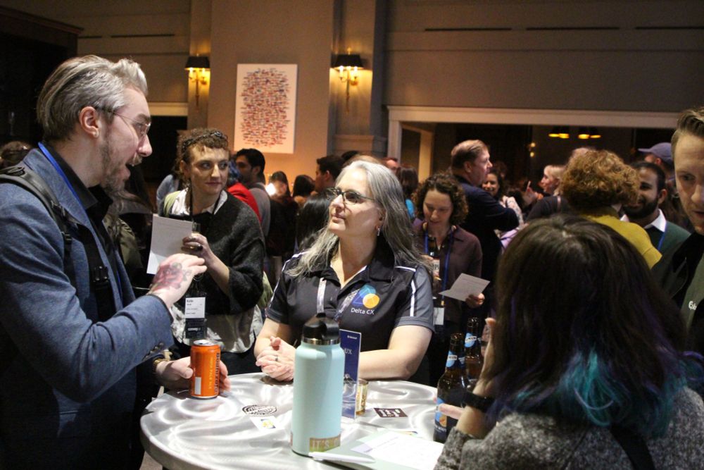 Mike chats with Debbie before the giant plate of salmon moved through the room.