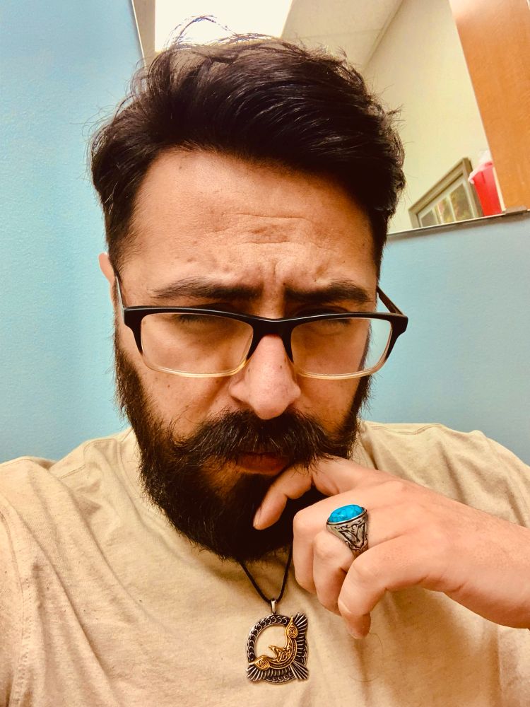 Hispanic man with glasses. Who’s waiting for the week to be over. 