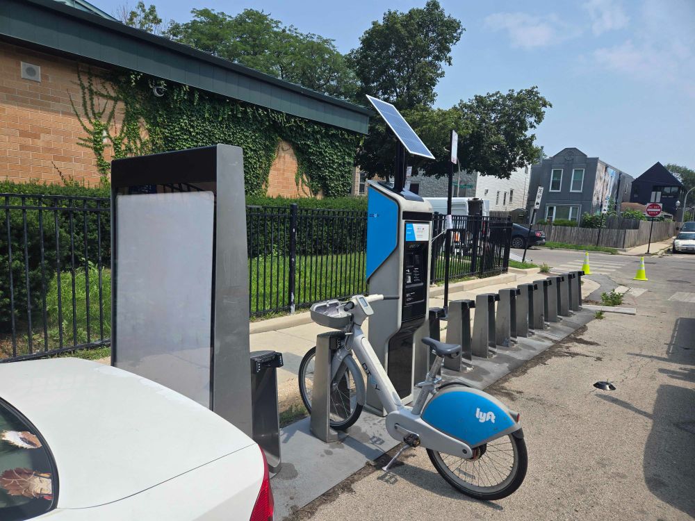 New Divvy station in the daylight zone next to a crosswalk