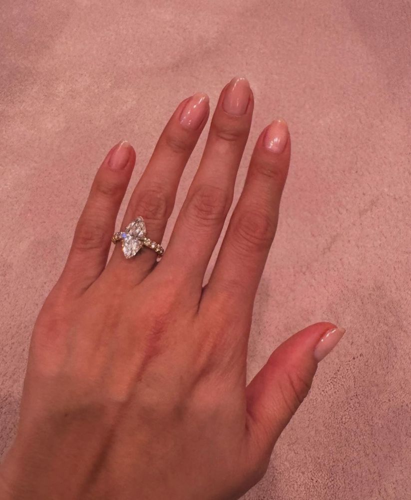 Photo of Selena Gomez’s hand with engagement ring. 