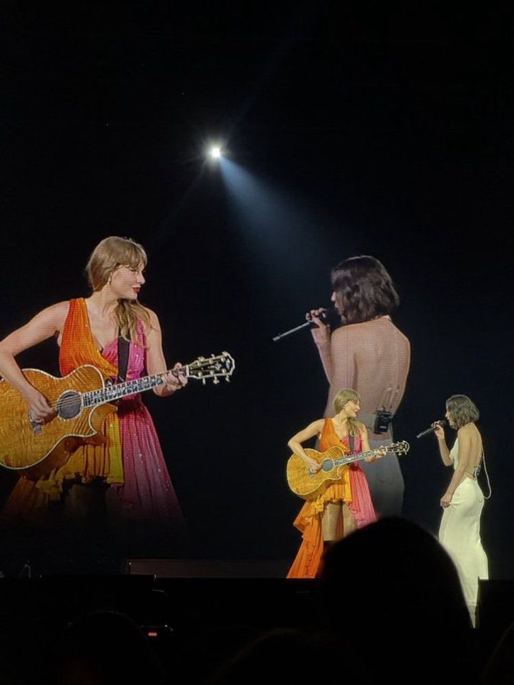 Taylor Swift and Gracie Abrams onstage at the Eras Tour in Toronto, Canada. 