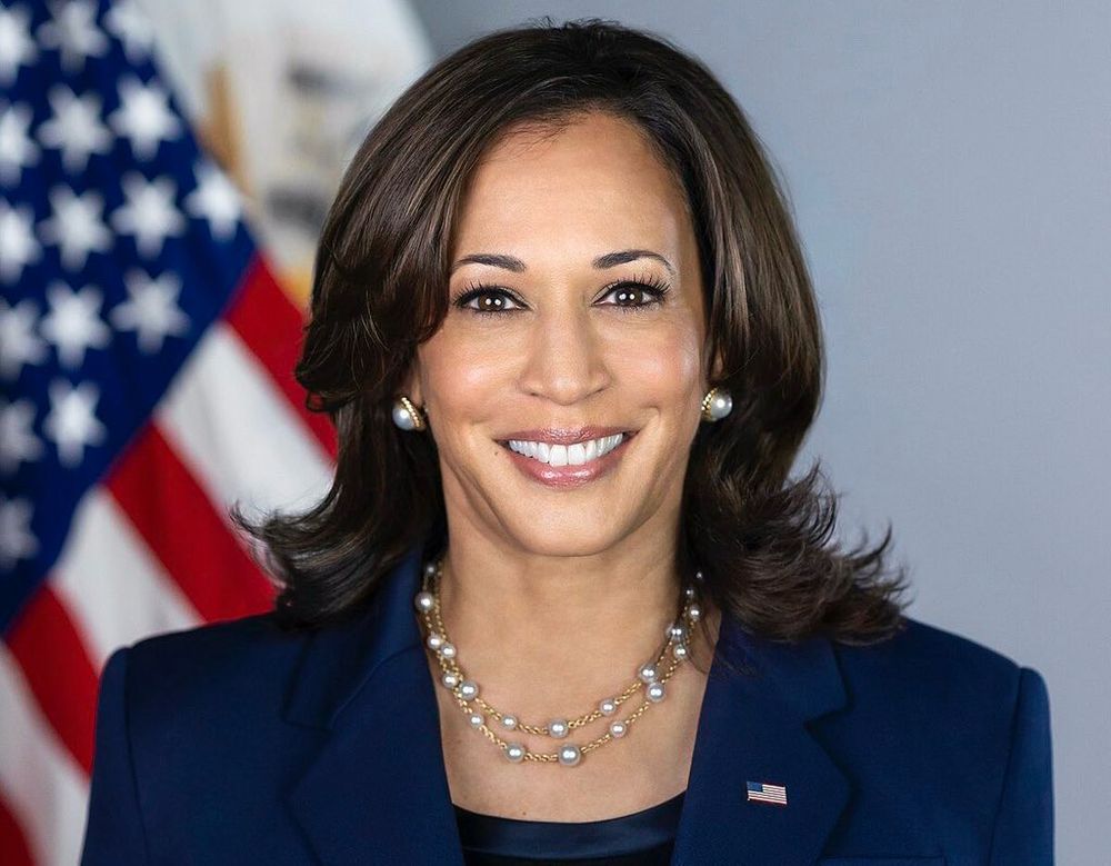 Photo of a smiling Kamala Harris. 