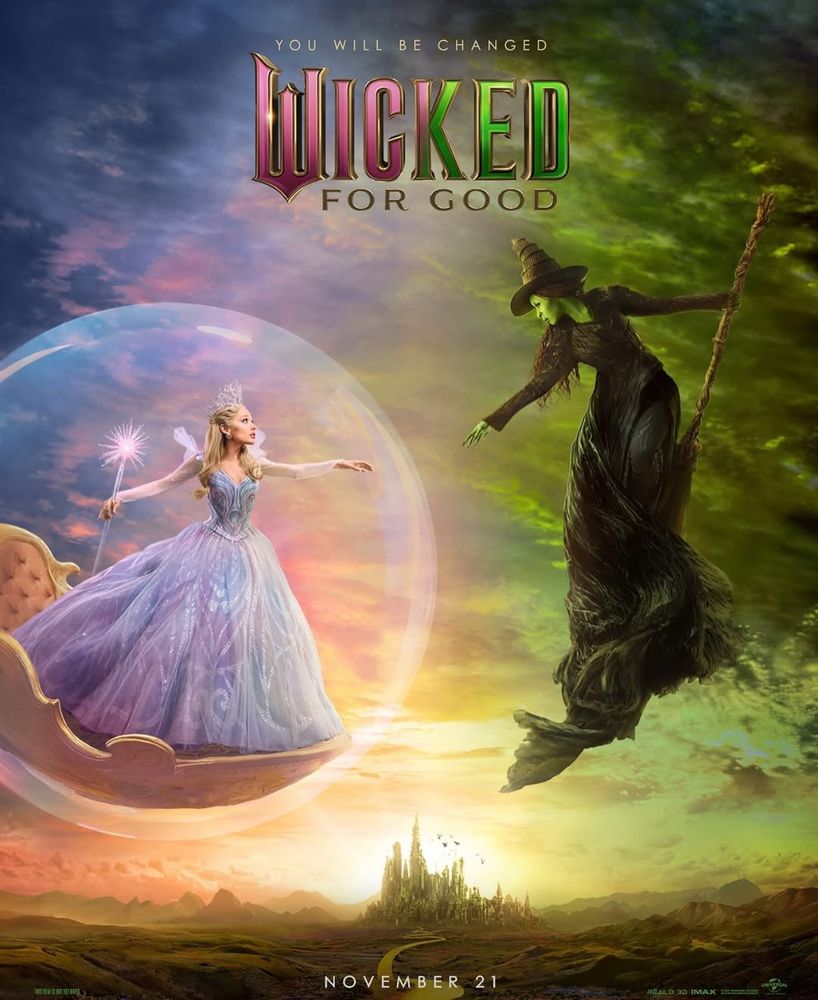 Ariana Grande and Cynthia Erivo reaching out for each other’s arm on the poster of ‘Wicked: For Good.’
