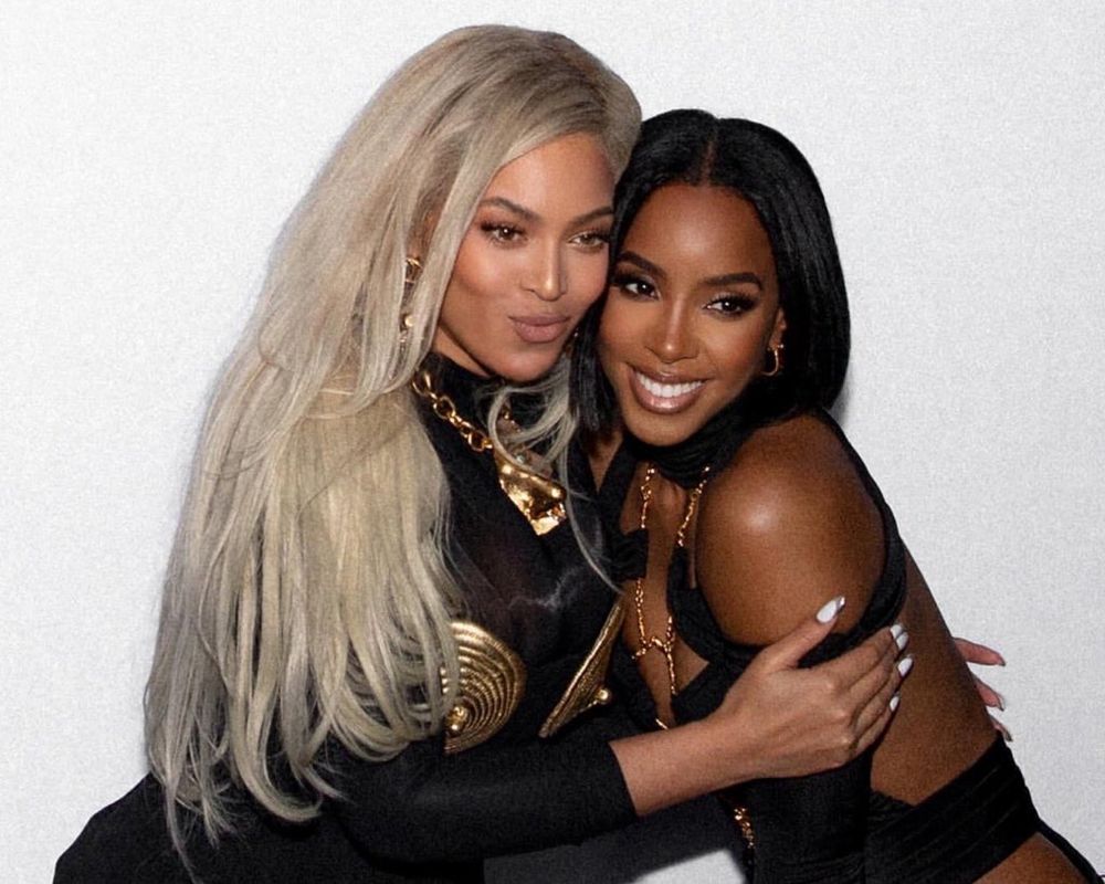 Photo of Beyoncé and Kelly Rowland embracing each other with a hug.
