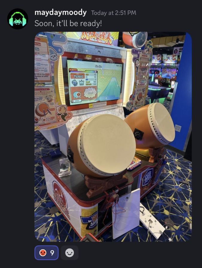 Taiko Nijiro Cab in Ohio being worked on by arcade staff