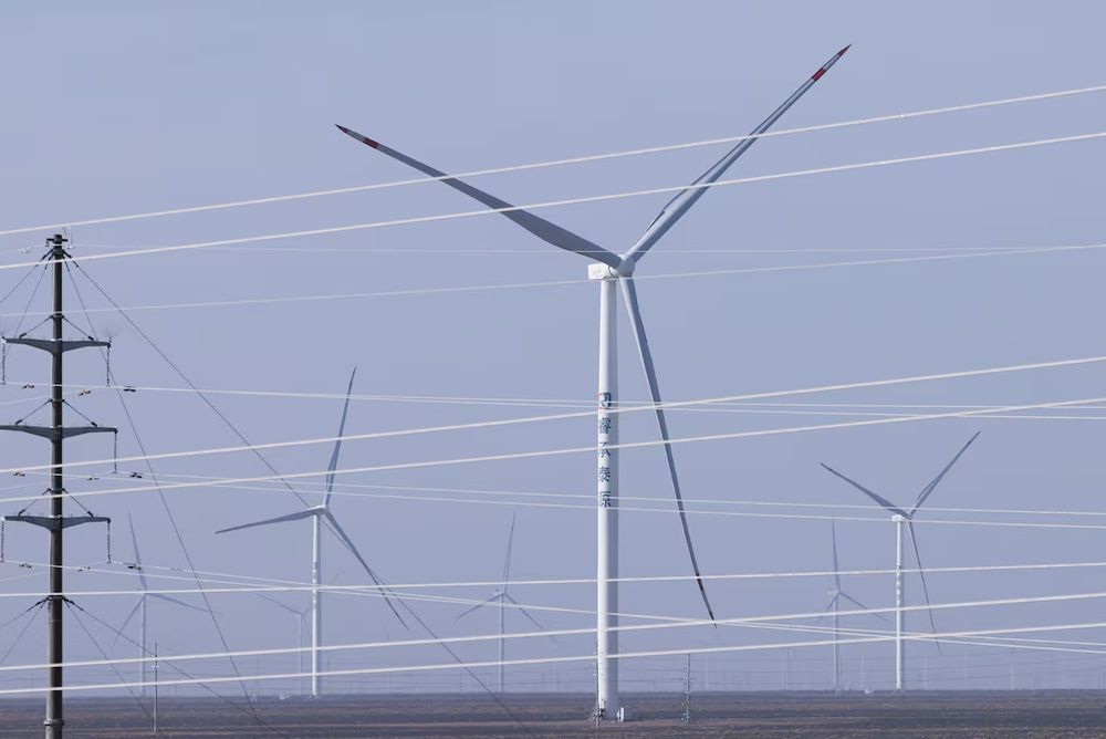 A general view of a Taiyuan New Energy Co wind farm, during an organised media tour, in Jiuquan, Gansu province, China October 17, 2024. REUTERS/Tingshu Wang/File Photo