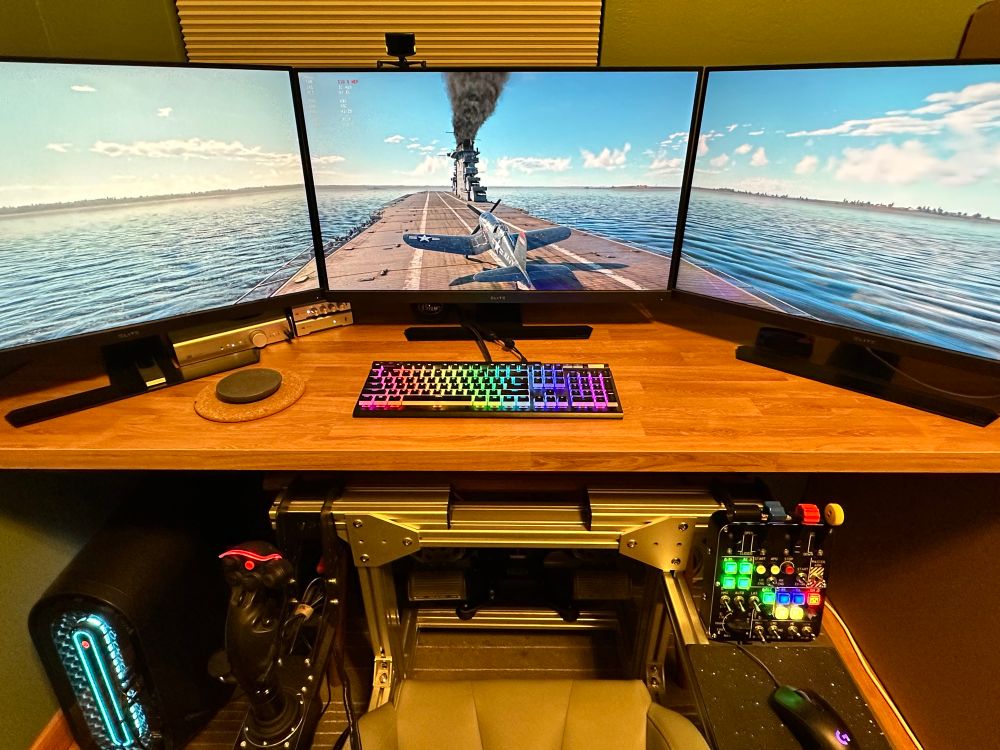 Warthunder F4U Corsair on a carrier deck. Triple monitor, full flight controls. Dell Alienware.
