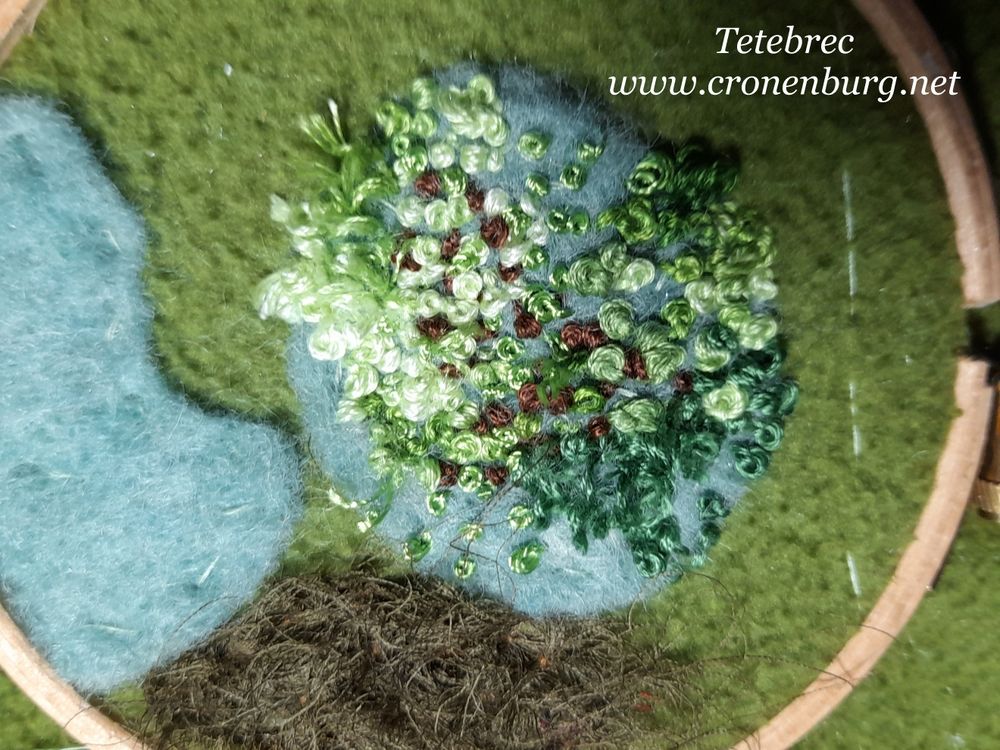 I start with thick felt for building some 3D structures. The moss is stitched in French knot technique. The more I use colour shades and irregularity, the more it looks naturally.